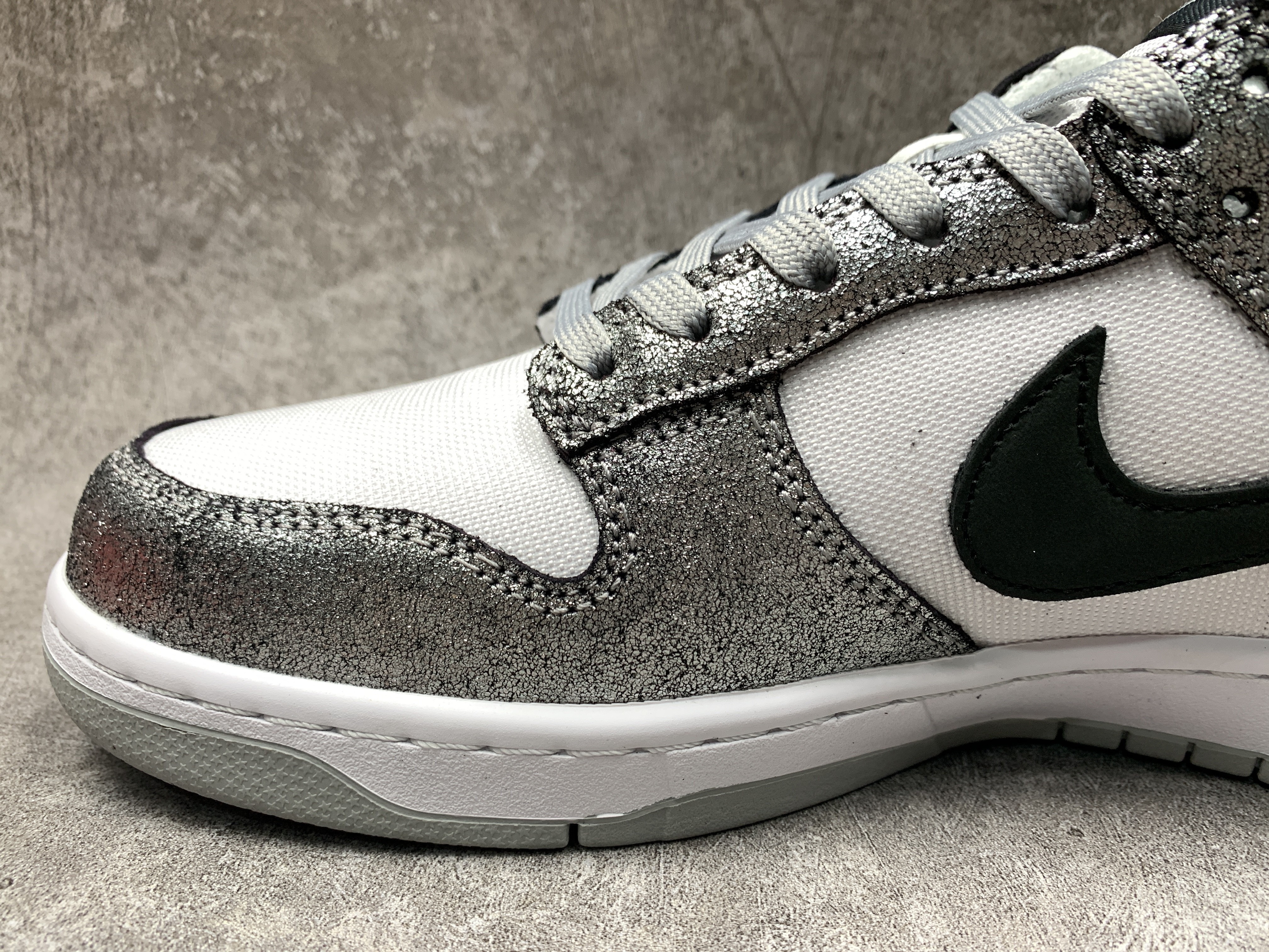Nike Dunk Low Features Silver Cracked Leather