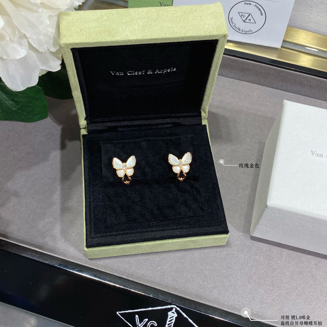 V*N CL*F & arpels white mother-of-pearl butterfly earrings