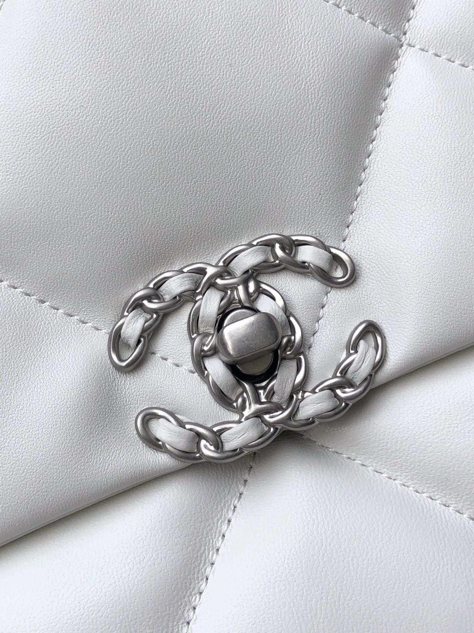 Ch*el 19 large handbag shiny leather, gold-tone, silver-tone & ruthenium-finish metal white 7.8 × 11.7 × 3.9 in