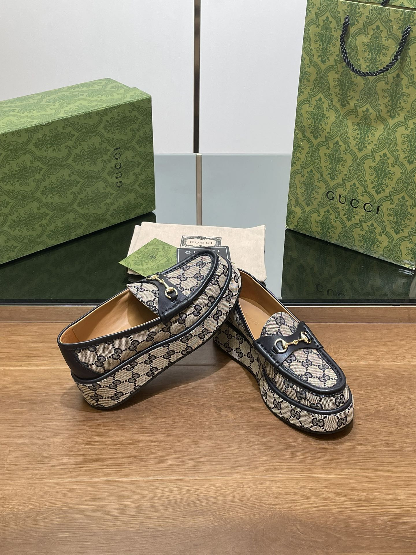 ua G*u*i horsebit wedge loafer