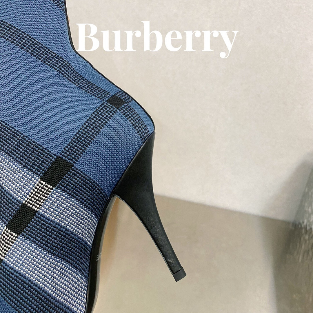 ua B**rry check high boots